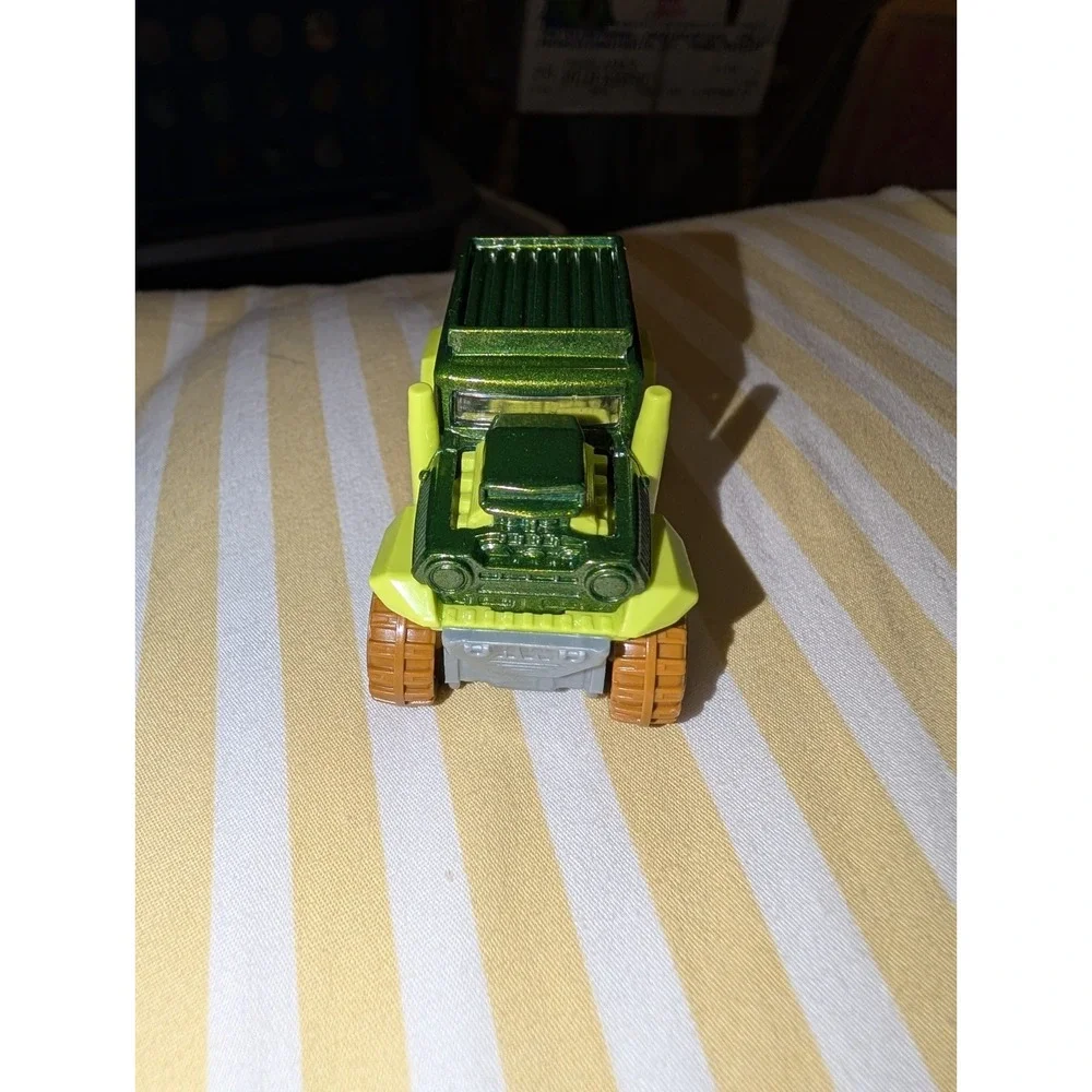 2012 Hot Wheels Jungle Rally BAD MUDDER 2 Green Diecast SUV 1:64 Scale